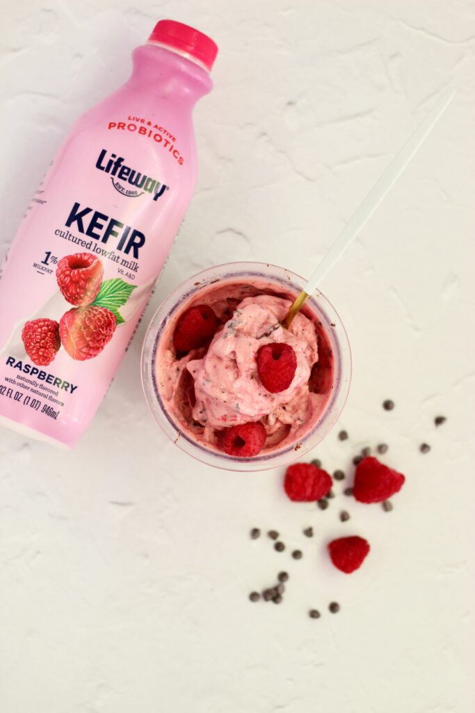 Raspberry Dark Chocolate Lifeway Kefir Protein Ice Cream in pint and Lifeway Kefir bottle