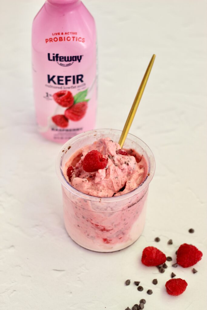 Raspberry Dark Chocolate Lifeway Kefir Protein Ice Cream in pint and Lifeway Kefir bottle