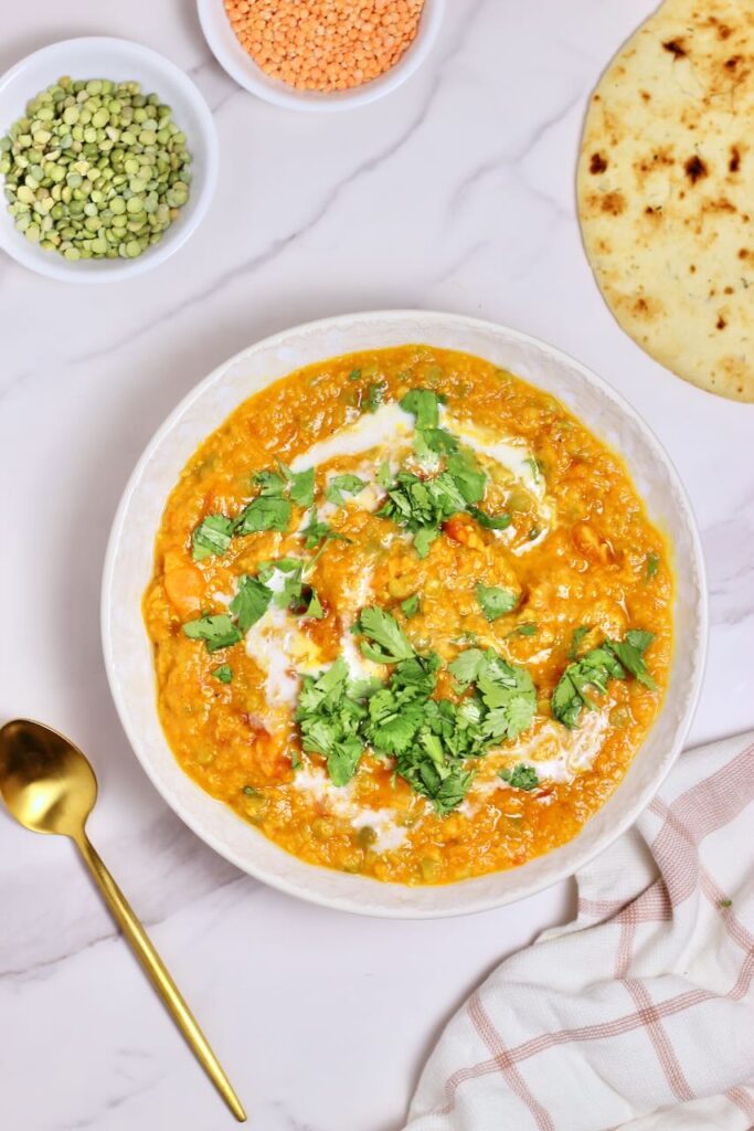 Golden Curry Lentil Dry Soup Mix final product in bowl and gold spoon on side