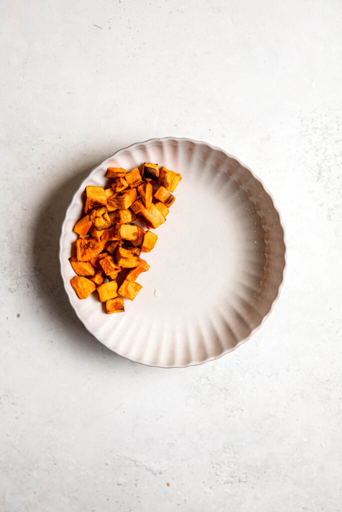 Sweet potatoes on white plate