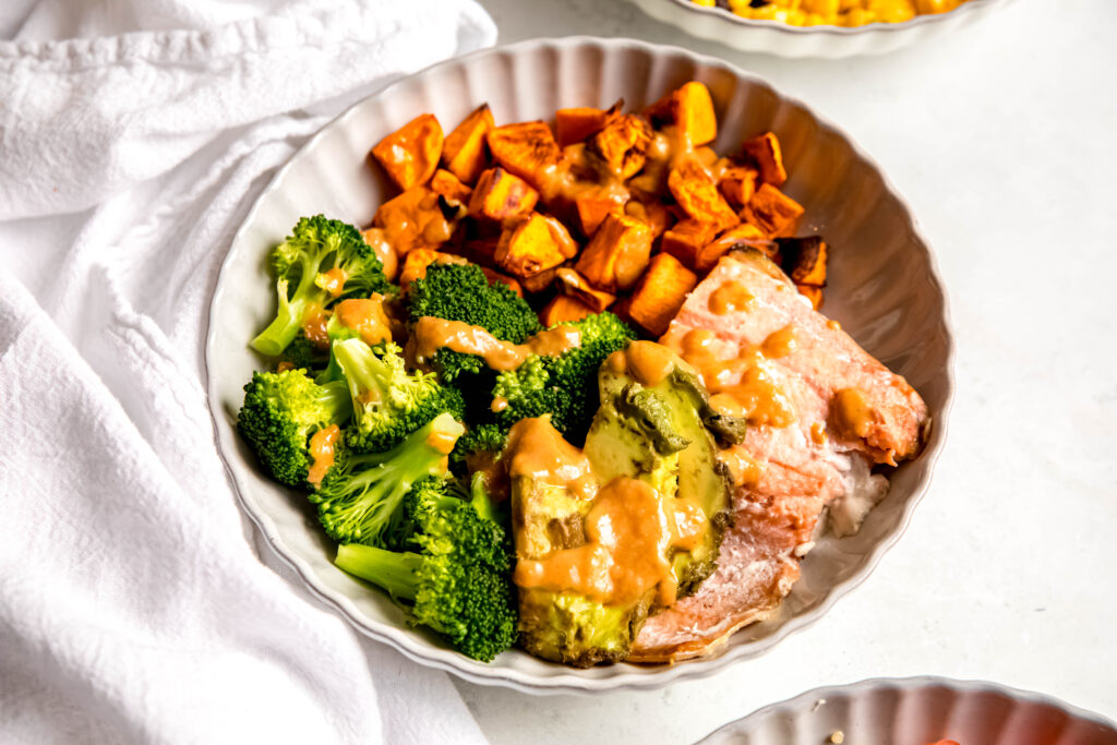 Power bowl with sauce drizzled on top