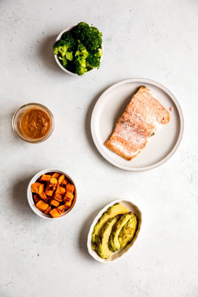 ingredients for power bowl in separate white bowls