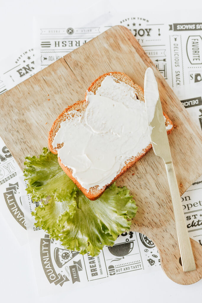 Mayo spread on wheat bread