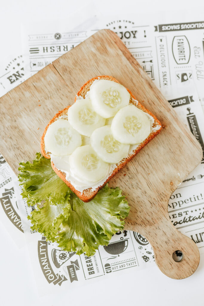Cucumbers added to mayo and bread