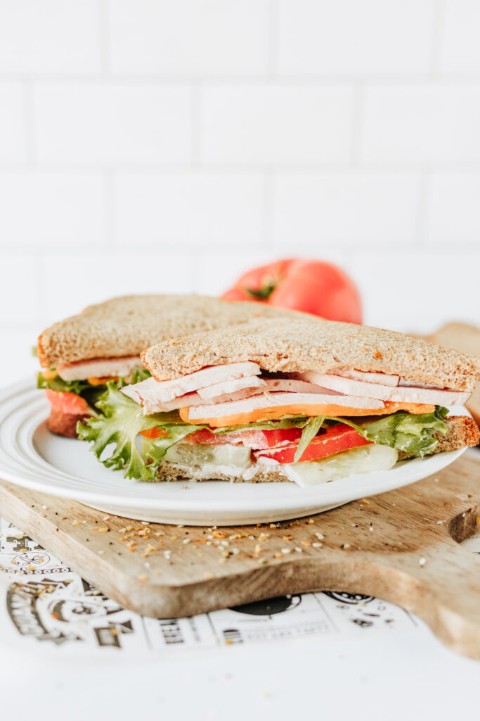 Customizable healthy sandwich on wood cutting board