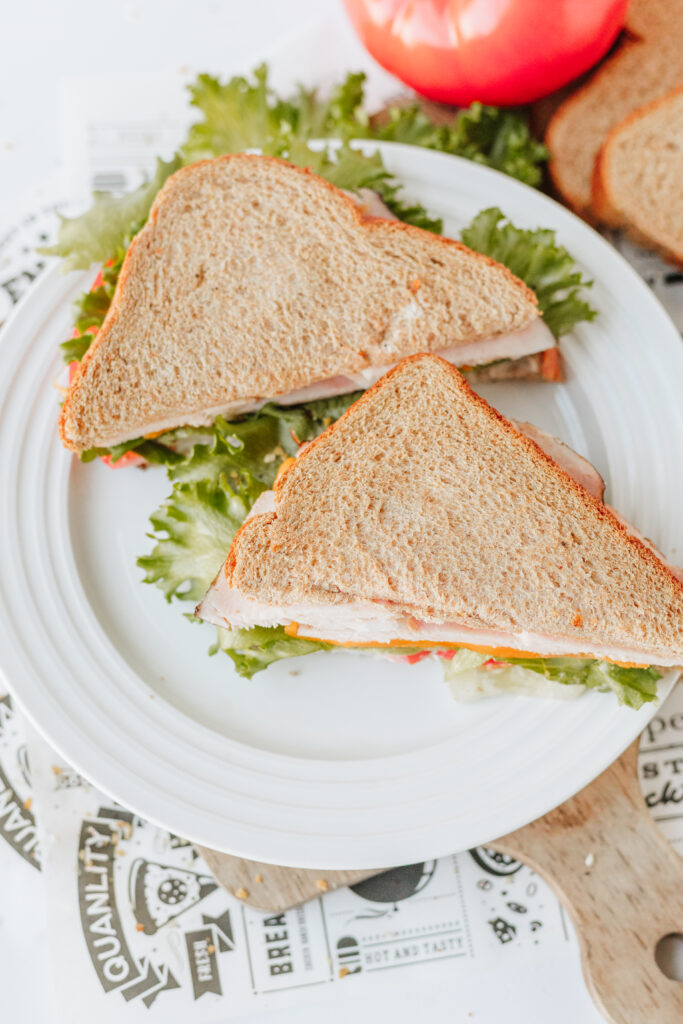 Sandwich halves on white plate