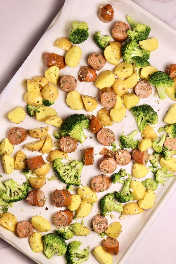 Sheet pan sausage and veggies before cooking