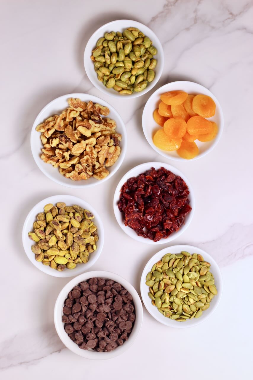 Ingredients of your choice in white bowls