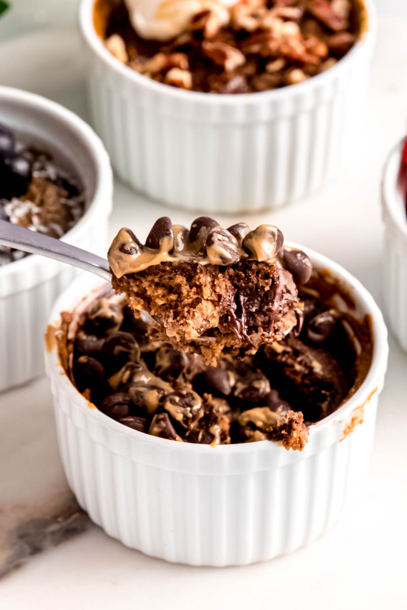 Customizable Baked Oats with spoon taking scoop out