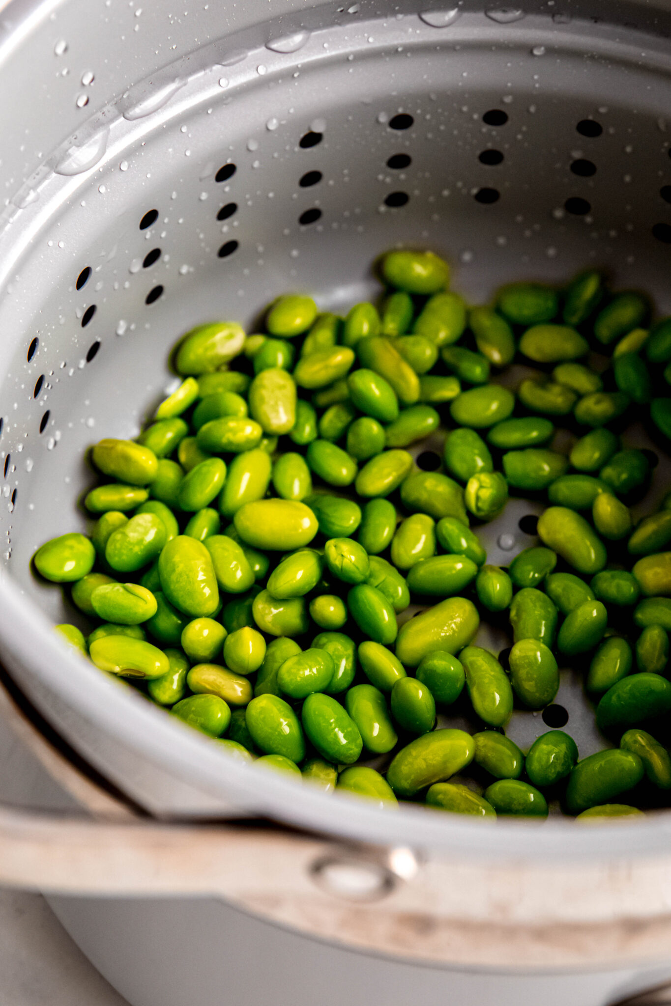 shelled edamame in collander