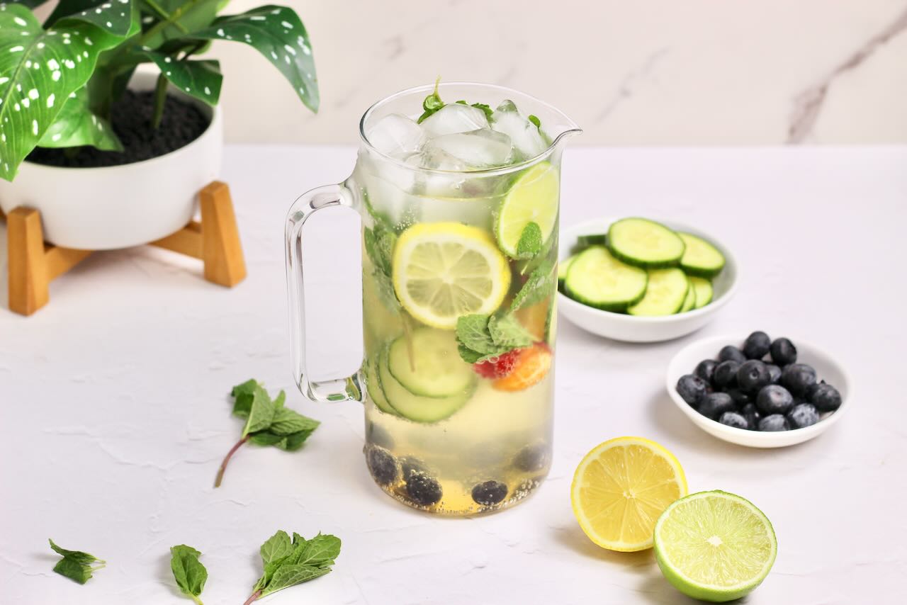 Infused water with lemons, limes, cucumbers, and blueberries