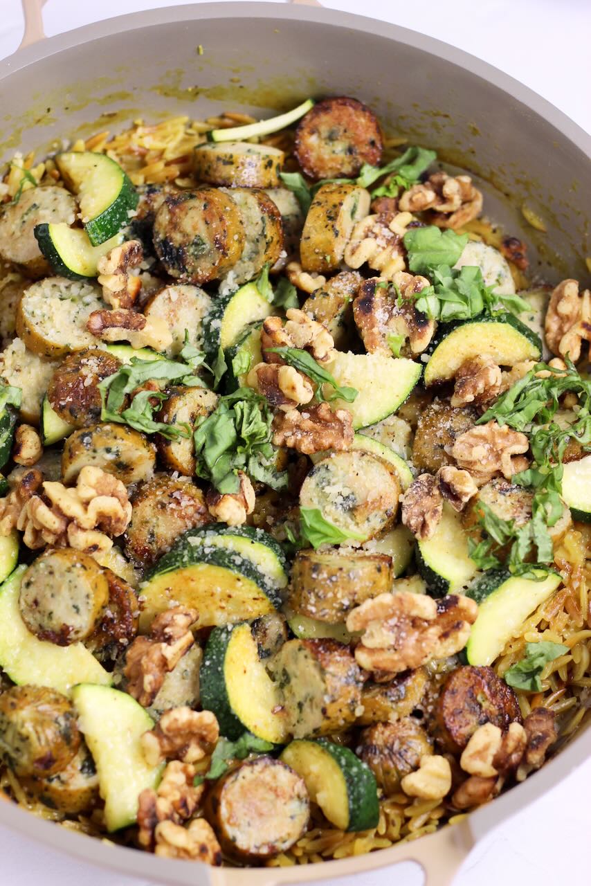 Sausage Orzo Risotto with garnish close up