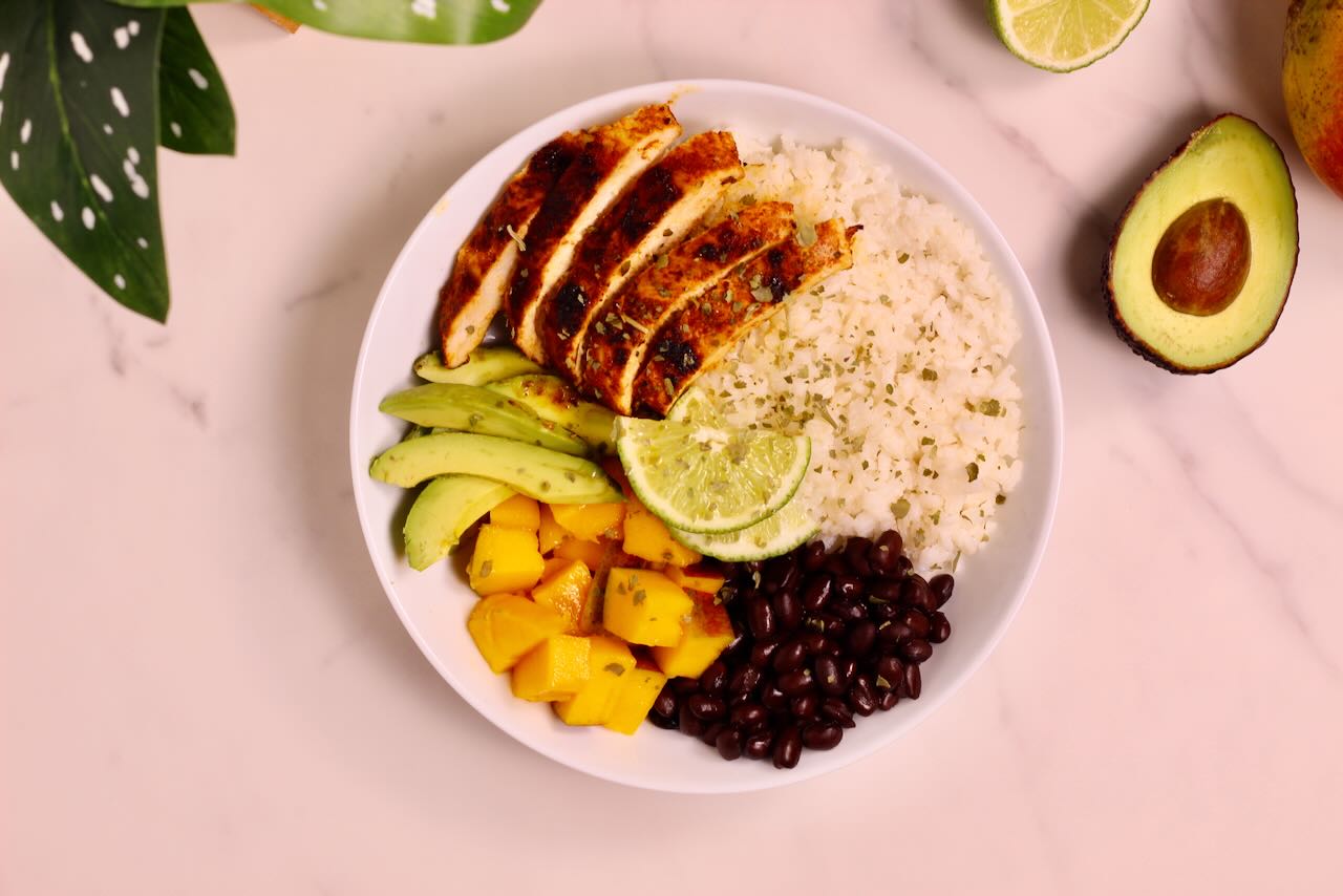 Mango Coconut Tropical Rice Bowl with avocado on side